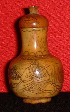 Carving on animal bone (Front view)