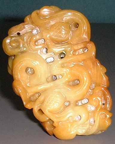 Orange jade piece (Back view)