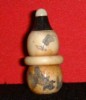 Carving on animal bone (Fan & Goldfish)