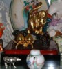 Golden Monkey holding a peach symbolises longeivity